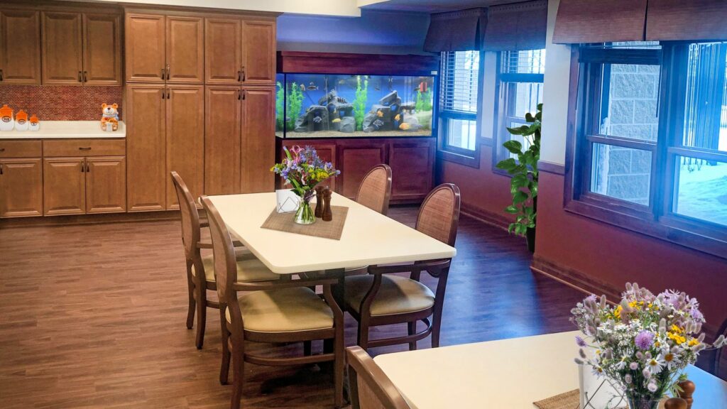 aquarium in the corner of a dining room