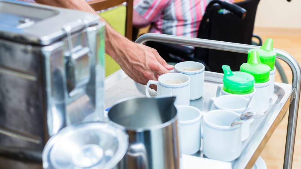 nurse grabbing coffee for a patient